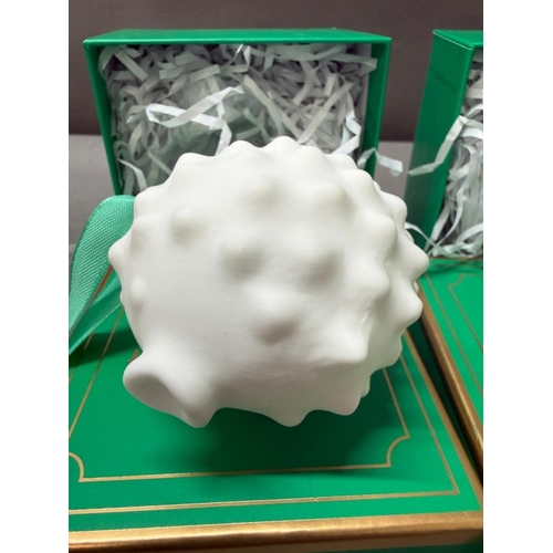19 - Jonathan Adler Rabbit and Pufferfish porcelain decorations.