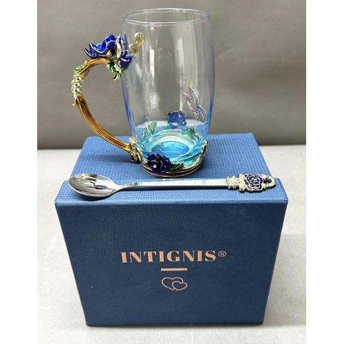 29 - A Heavily decorated glass tankard with spoon, original box, as new.