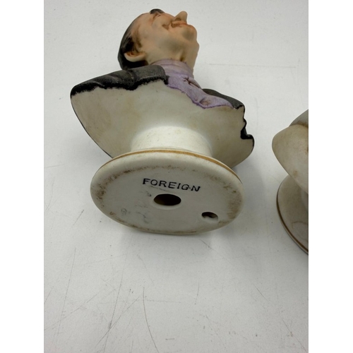 45 - A pair of bisque busts of a man and a woman