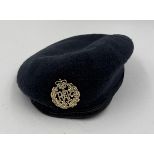 52 - A blue RAF cap with a central badge