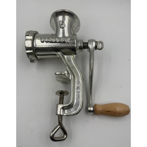 57 - A vintage cast iron meat grinder