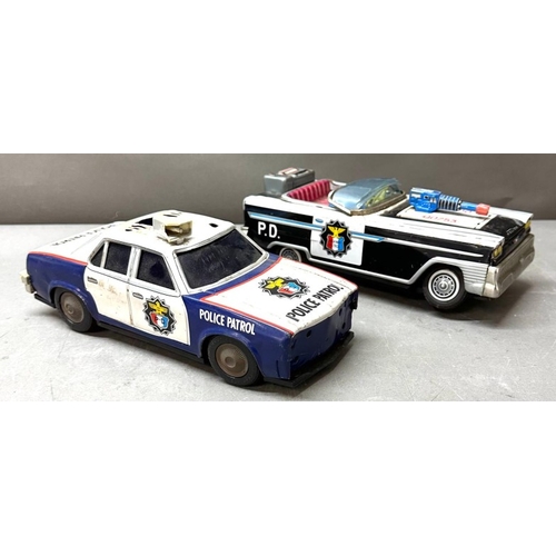 7 - Two AF Japanese tinplate cars, Police patrol and Highway patrol