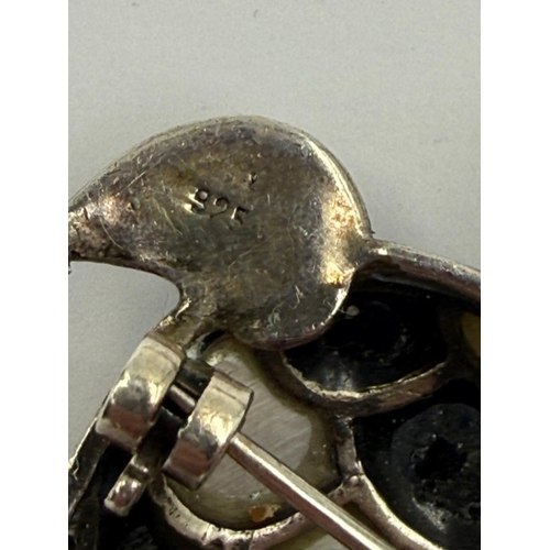 100 - Six silver stamped brooches (violin dog turtle owl and beautiful keltic design) plus a bug/fly brooc... 