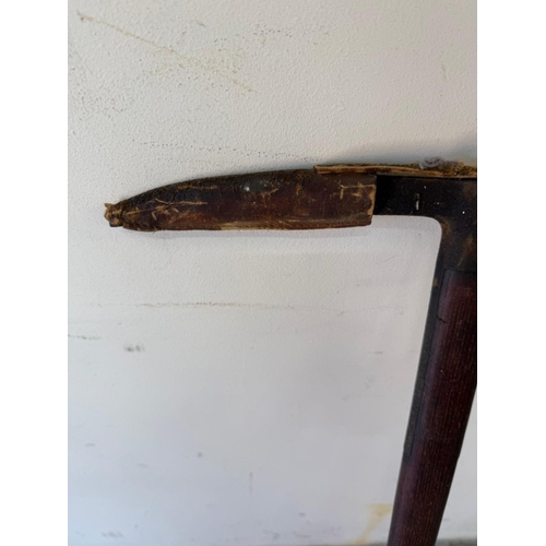 102 - A vintage wooden maintenance pick axe