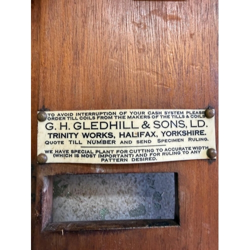 105 - A 1920's mahogany analogue cash register by Gledhill and Sons of Halifax
