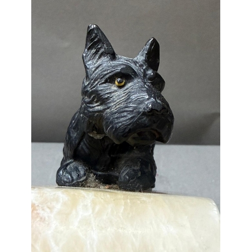 106 - Pair of Art Deco bookends with spelter dogs on alabaster bases.