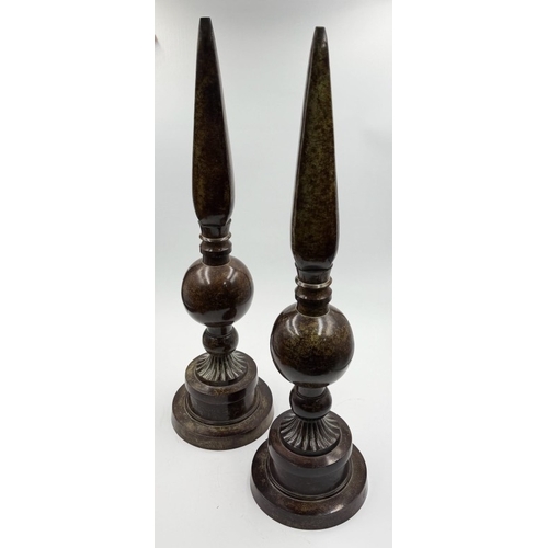 107 - A pair of obelisks finials H53cm