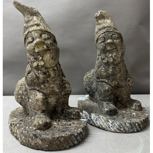 109 - Pair of stone gnome garden statues