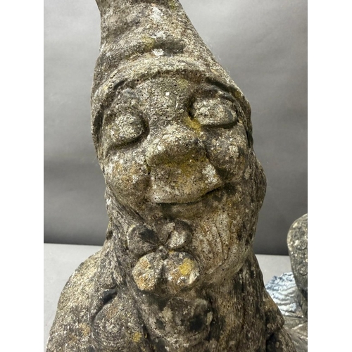 109 - Pair of stone gnome garden statues