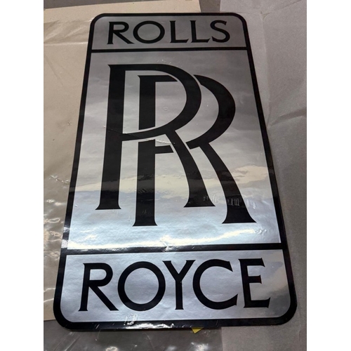 110 - A Rolls Royce sticker sign.