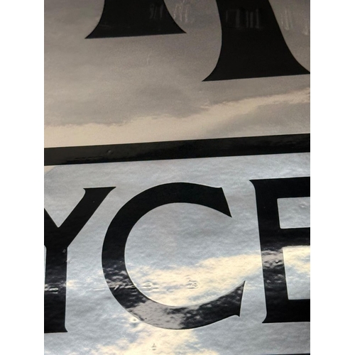 110 - A Rolls Royce sticker sign.