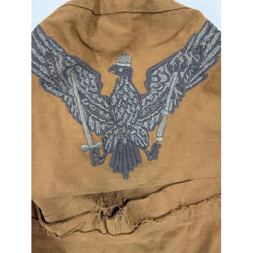 114 - An item of costume from Shout At The Devil starring Lee Marvin and Roger Moore together with a black... 