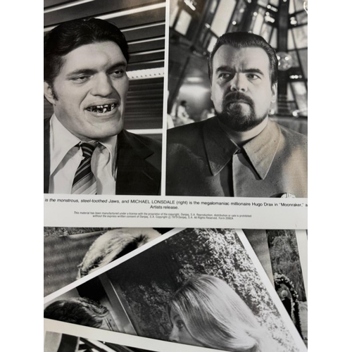 116 - A quantity of black and white stills, from a variety of James Bond films