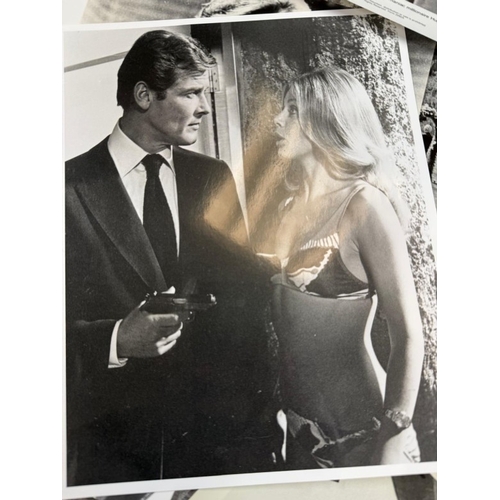 116 - A quantity of black and white stills, from a variety of James Bond films