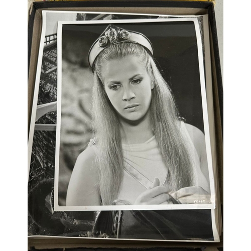 125 - A large collection of black and white and colour still images and headshots of various actresses, in... 