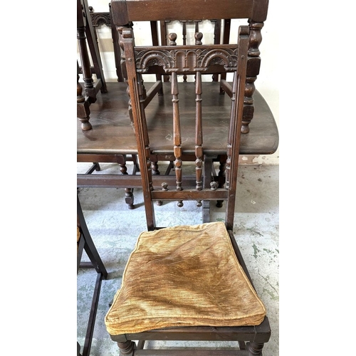 129 - An Ercol dining table with six Ercol old colonial Yorkshire dining chairs with high back gothic desi... 