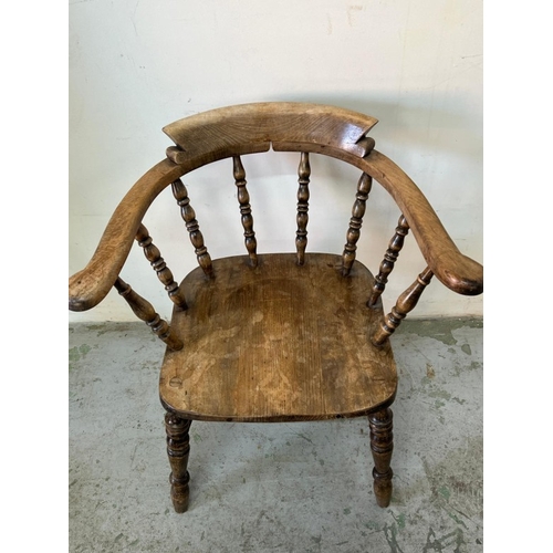 132 - English smokers' bow chair or captain chairs