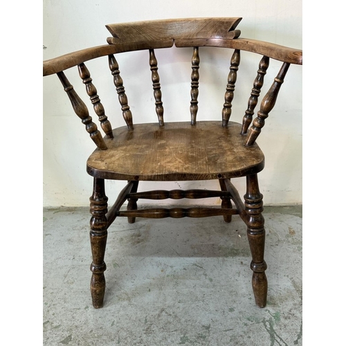 132 - English smokers' bow chair or captain chairs