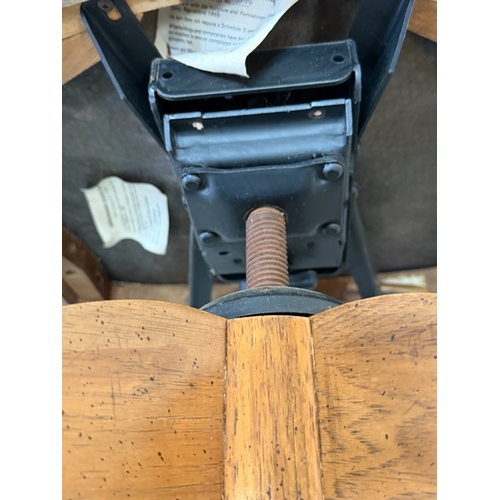 141 - Maple and Co desk chair with cane back swivel action