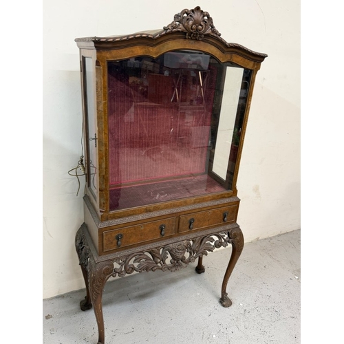 149 - A Queen Anne style display cabinet on cabriole legs H179cm W96cm D42cm