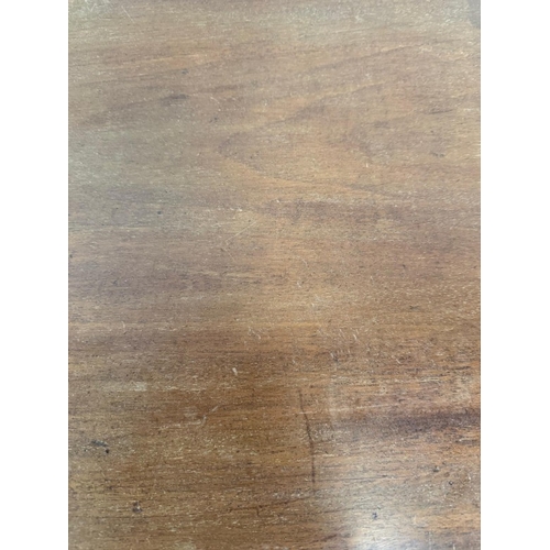 152 - A mahogany side table on tapering legs H63cm W90cm D50cm