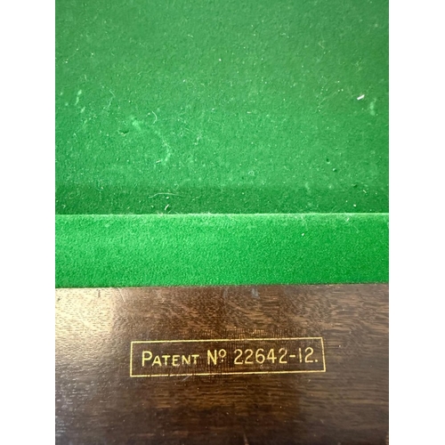 153 - A mahogany dining table on baluster legs with removable top revealing a green base snooker table H79... 