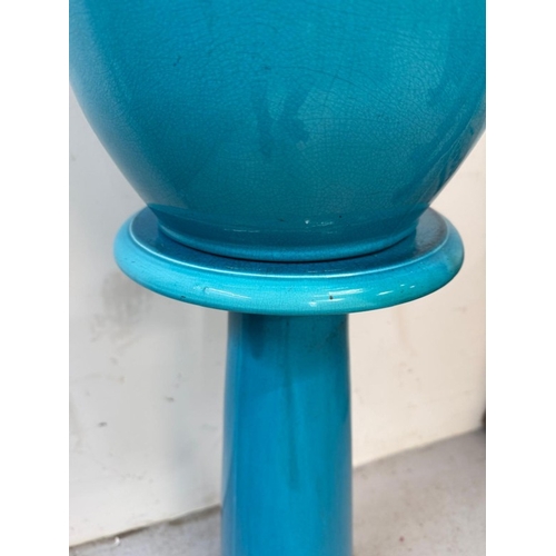 156 - A Burmantofts faience turquoise glazed jardinière on stand H100cm Dia 39cm