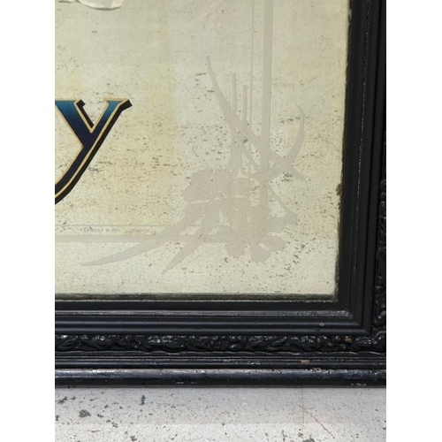 163 - An Usher's O.V.G Whisky over mantle pub mirror 142cm x 91cm