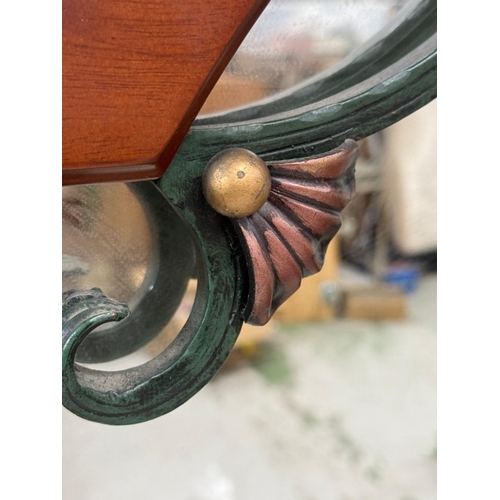 166 - A mahogany cheval mirror with arched pediment H183cm W79cm