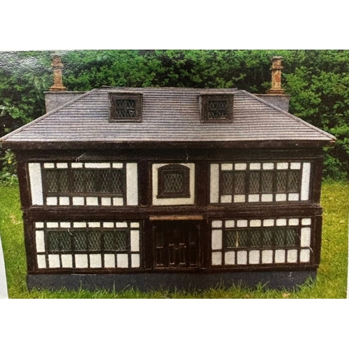 176 - A large 1920s-30s unique, scratch-built dolls' house, in the form of a large 1920s Tudor-style 'Metr... 