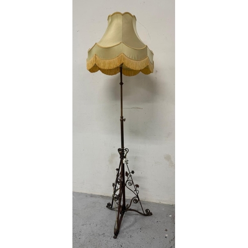 415 - An Arts and Crafts style brass standard lamp