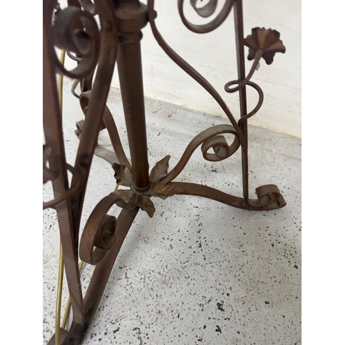 415 - An Arts and Crafts style brass standard lamp