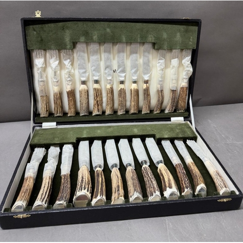 63 - A canteen of cutlery with Antler handles made by Harrods