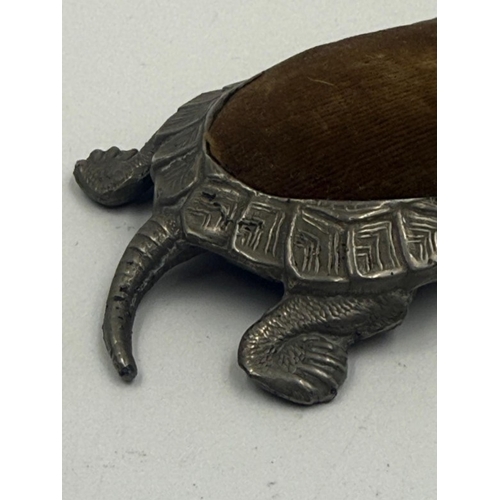 66 - A Chinese pewter tortoise pin cushion