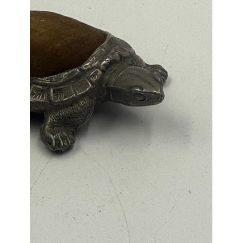 66 - A Chinese pewter tortoise pin cushion
