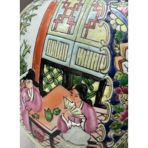 69 - A Chinese ginger jar in the famille rose pattern H22cm