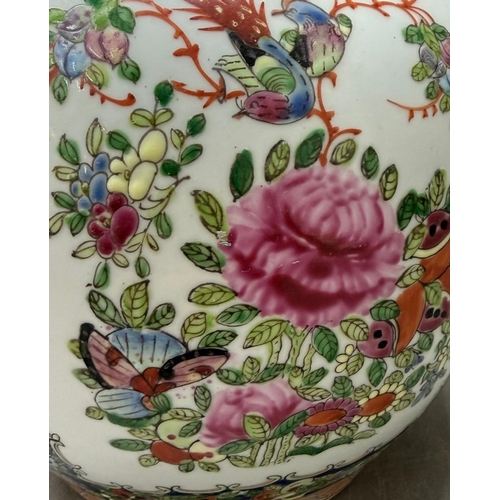 69 - A Chinese ginger jar in the famille rose pattern H22cm