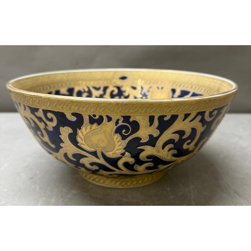 70 - A Chinese blue and gold tapestry bowl, together with a matching vase