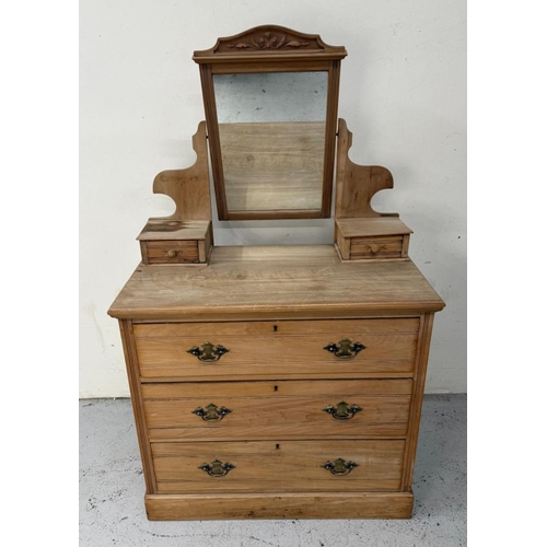 78 - A pine three drawer chest with a hinged mirror to top flanked by trinket drawers H153cm W92cm D50cm