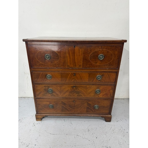 83 - A mahogany four-drawer chest of drawers with brass hoop handles H108cm W104cm D52cm
