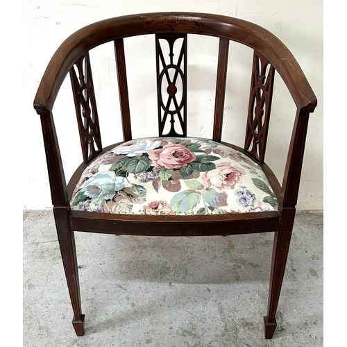 88 - A mahogany tub chair with a floral upholstered seat with tapered legs H75cm W53cm D46cm