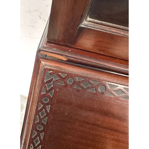 93 - A glazed mahogany bureau bookcase above a sloped writing desk with graduated drawers H206cm W90cm D4... 