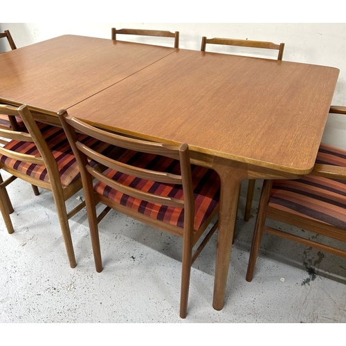 96 - A teak dining table by A.H.Mcintosh with six ladder back chairs with striped upholstered