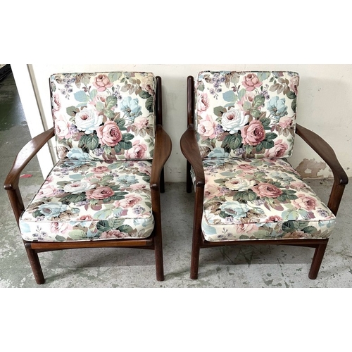 99 - A pair of vintage Mid-Century lounge chairs with a floral fabric