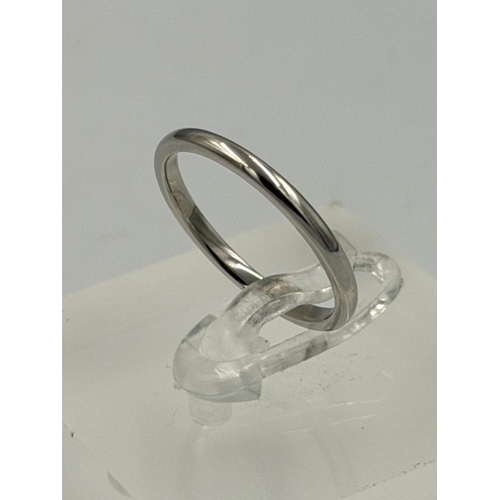 570 - A Biggs of Maidenhead platinum wedding band approximate weight 2.8g and size N in original box