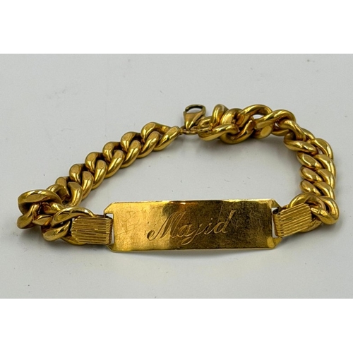 574 - An 18ct yellow gold identity bracelet, engraved, length approximately 19.5cm