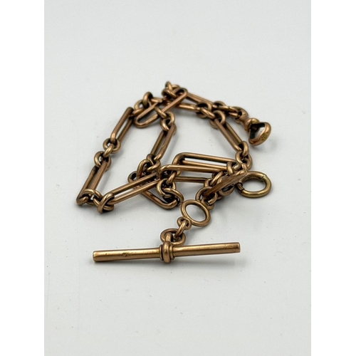 576 - A 9ct gold fancy link Albert chain with T Bar, approximate length 36cm.
