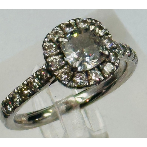 593 - A  square cushion Diamond halo ring, platinum set, marked 950, approximate size Q, Clarity FVSI, app... 