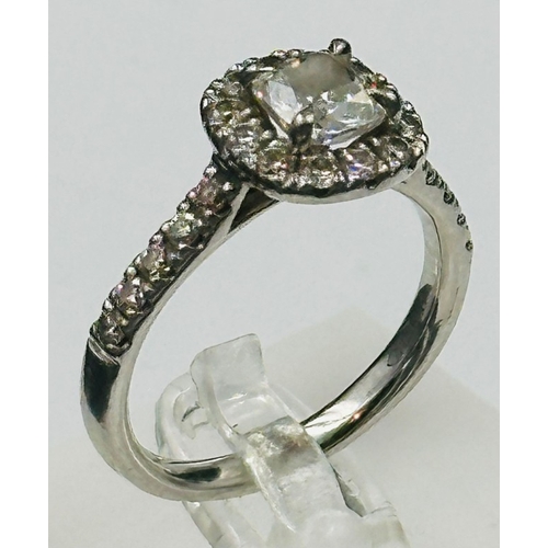 593 - A  square cushion Diamond halo ring, platinum set, marked 950, approximate size Q, Clarity FVSI, app... 