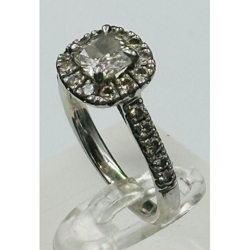 593 - A  square cushion Diamond halo ring, platinum set, marked 950, approximate size Q, Clarity FVSI, app... 